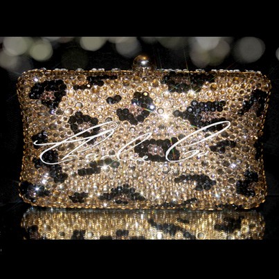 gold hard case clutch bag